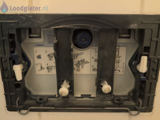 Loodgieter spoelknop toilet lam Reparatie spoelknop